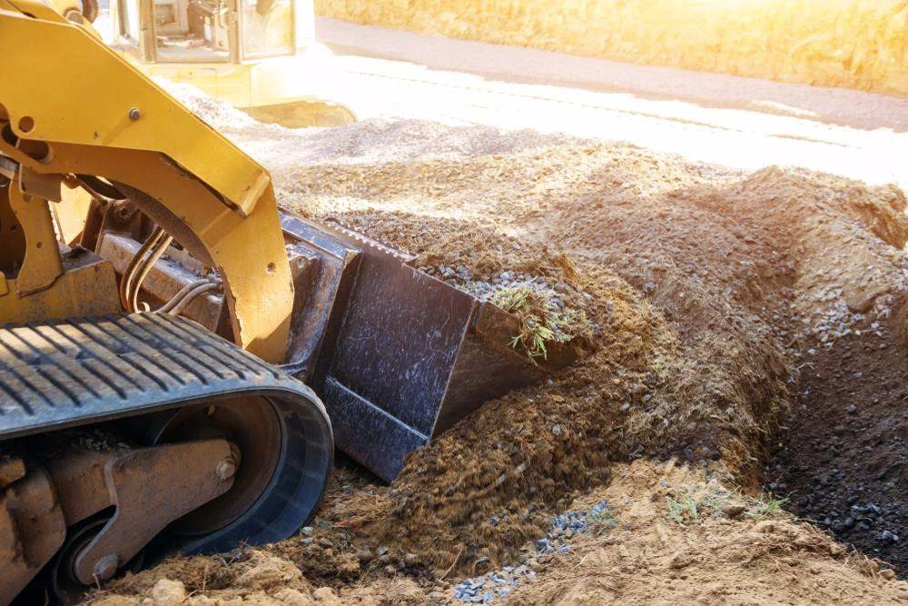 Top Shelf Earth Works operator on a residential site